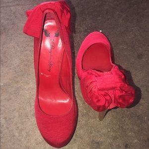 Red heels. NEVER WORN. Size 8